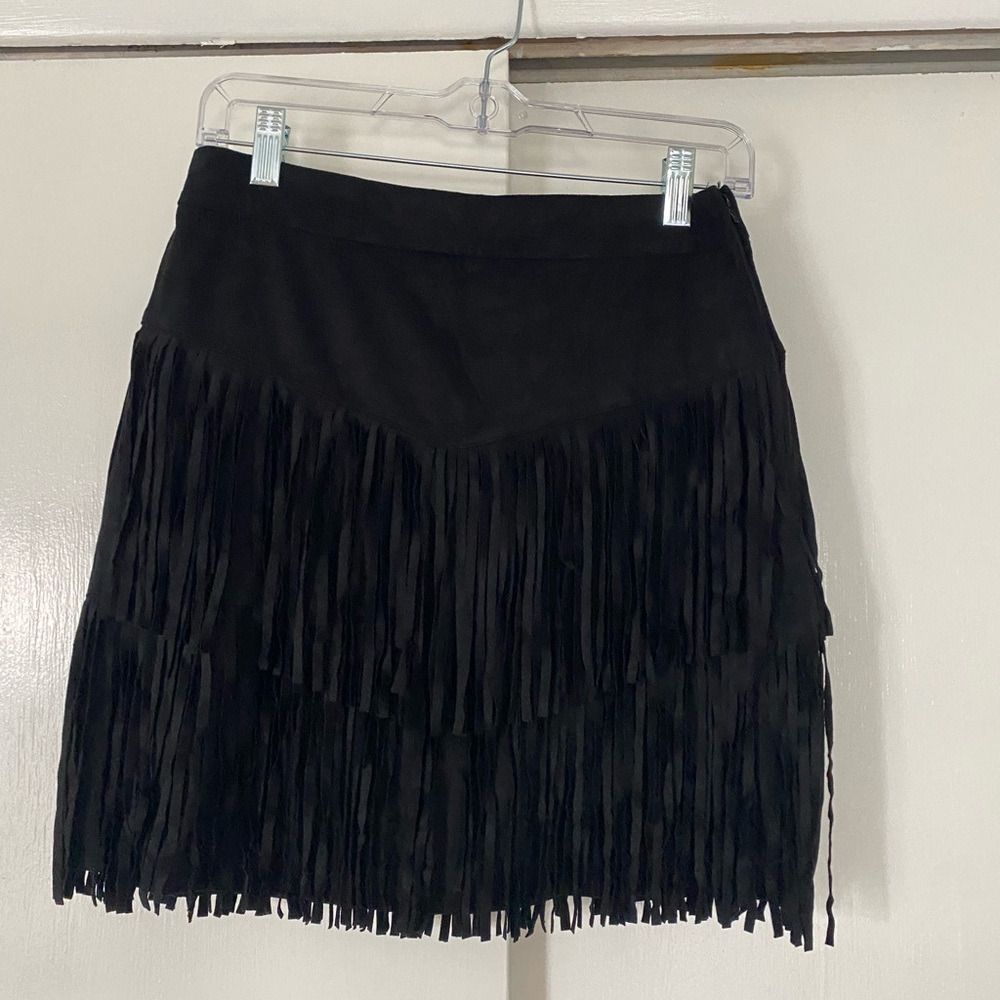 Francesca’s black tassel skirt